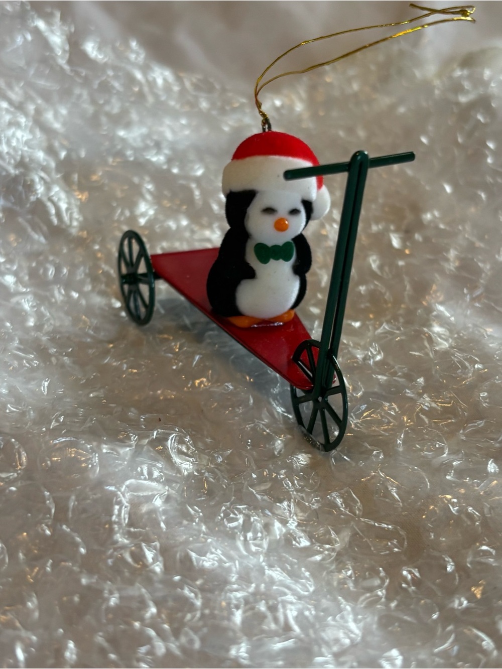 Vintage Avon Jolly Penguin on a Scooter Ornament